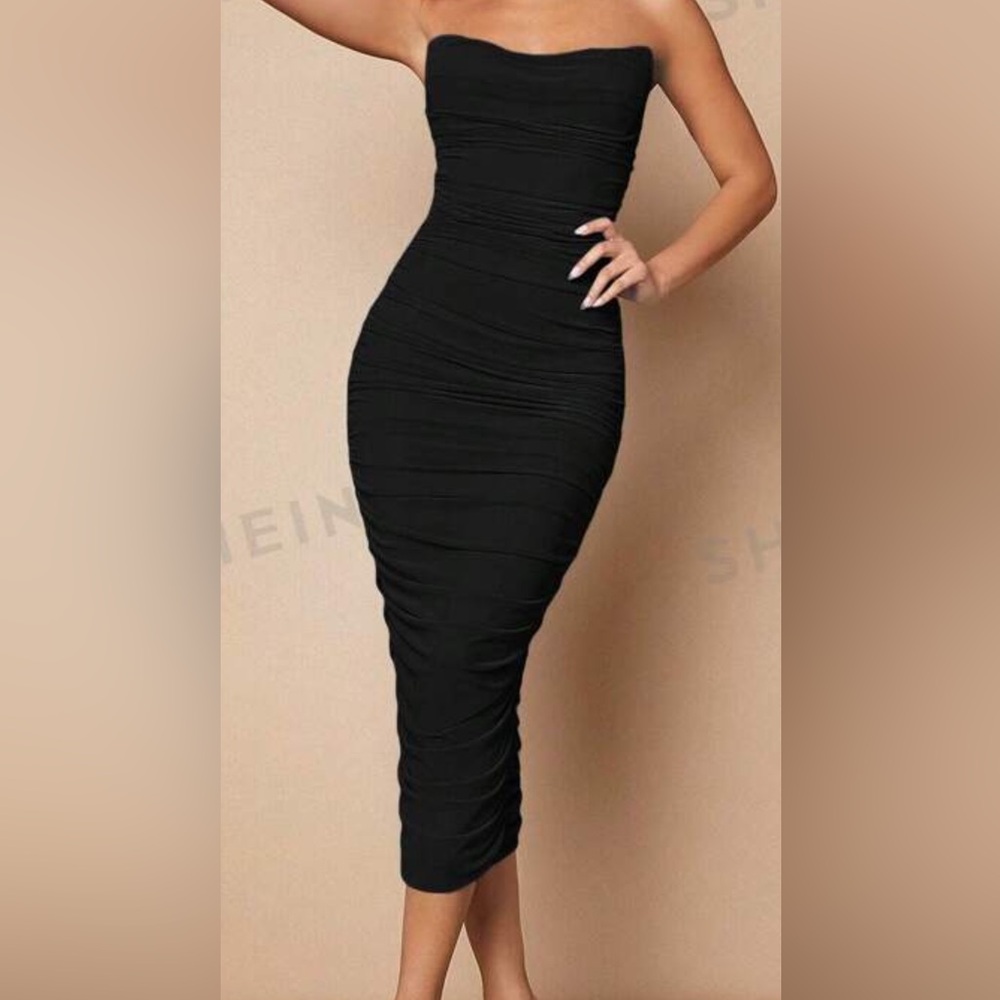 Medium (6) black strapless bodycon pleaded dress.